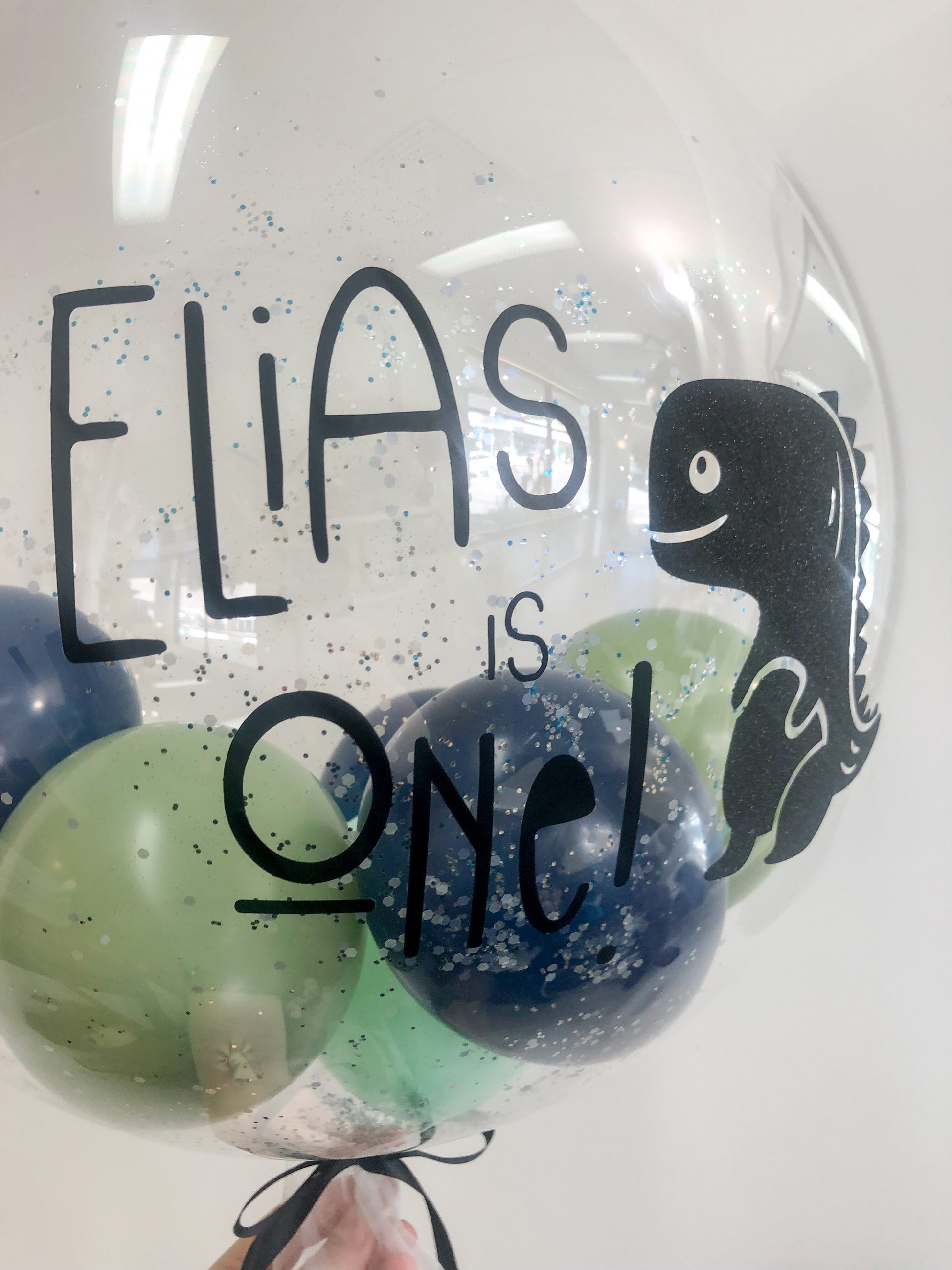 Colourful and magical Helium Birthday Bubble Balloon for Kids.  Customised birthday balloon with you boy or girl's name on it. Perfect for kids of all ages.
