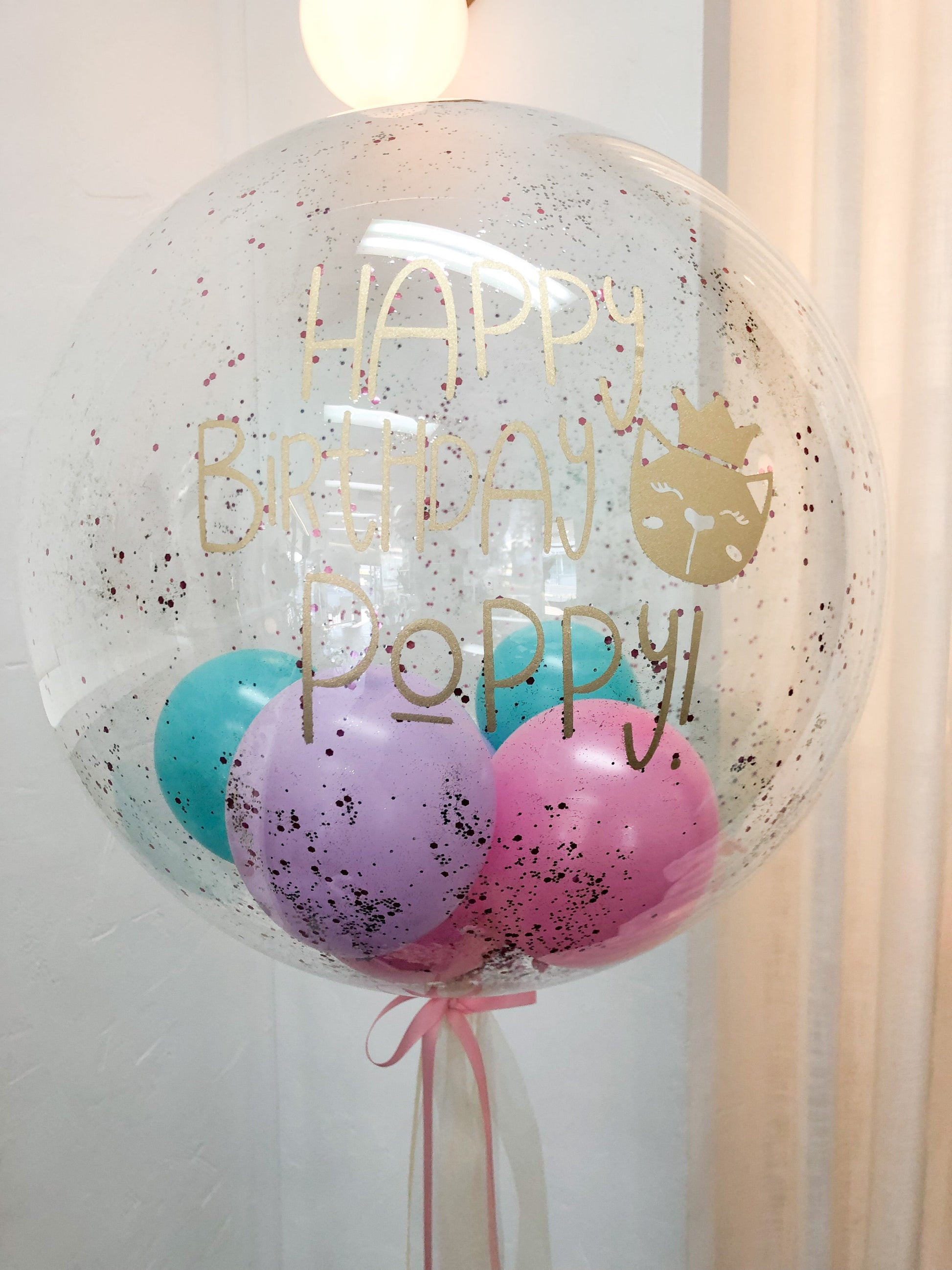Colourful and magical Helium Birthday Bubble Balloon for Kids.  Customised birthday balloon with you boy or girl's name on it. Perfect for kids of all ages.