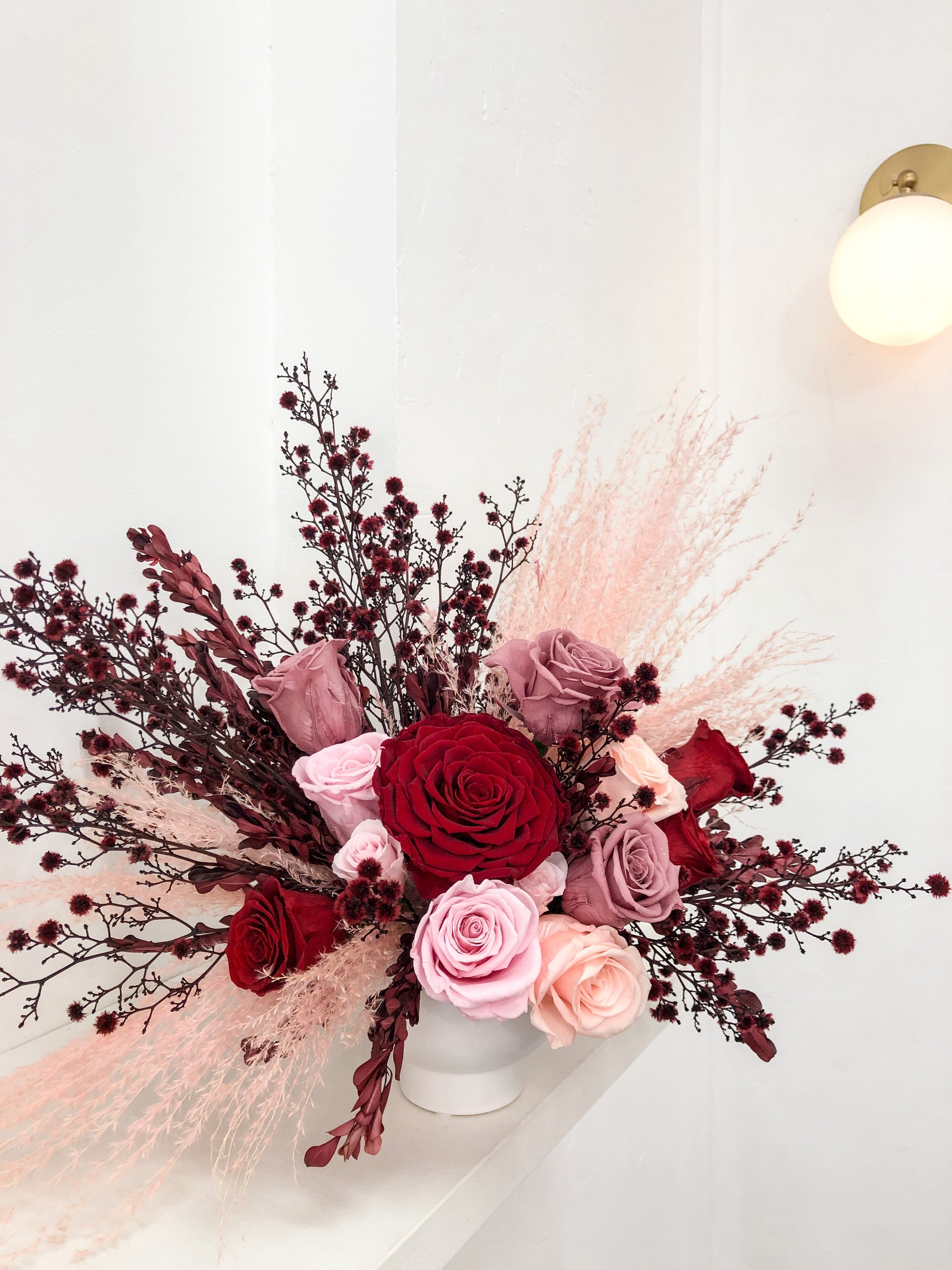 Order Valentine's Day Flower Delivery. Everlasting Flower Arrangements featuring a dozen roses by Newcastle Dried Flower Co.